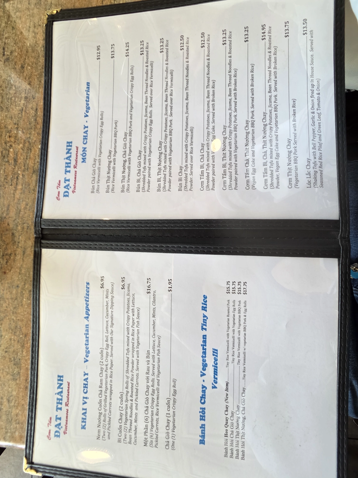 A second close-up of the menu, this section highlights vegetarian dishes and vermicelli options, with pricing for items such as vegetarian rice, noodle dishes, and appetizers.