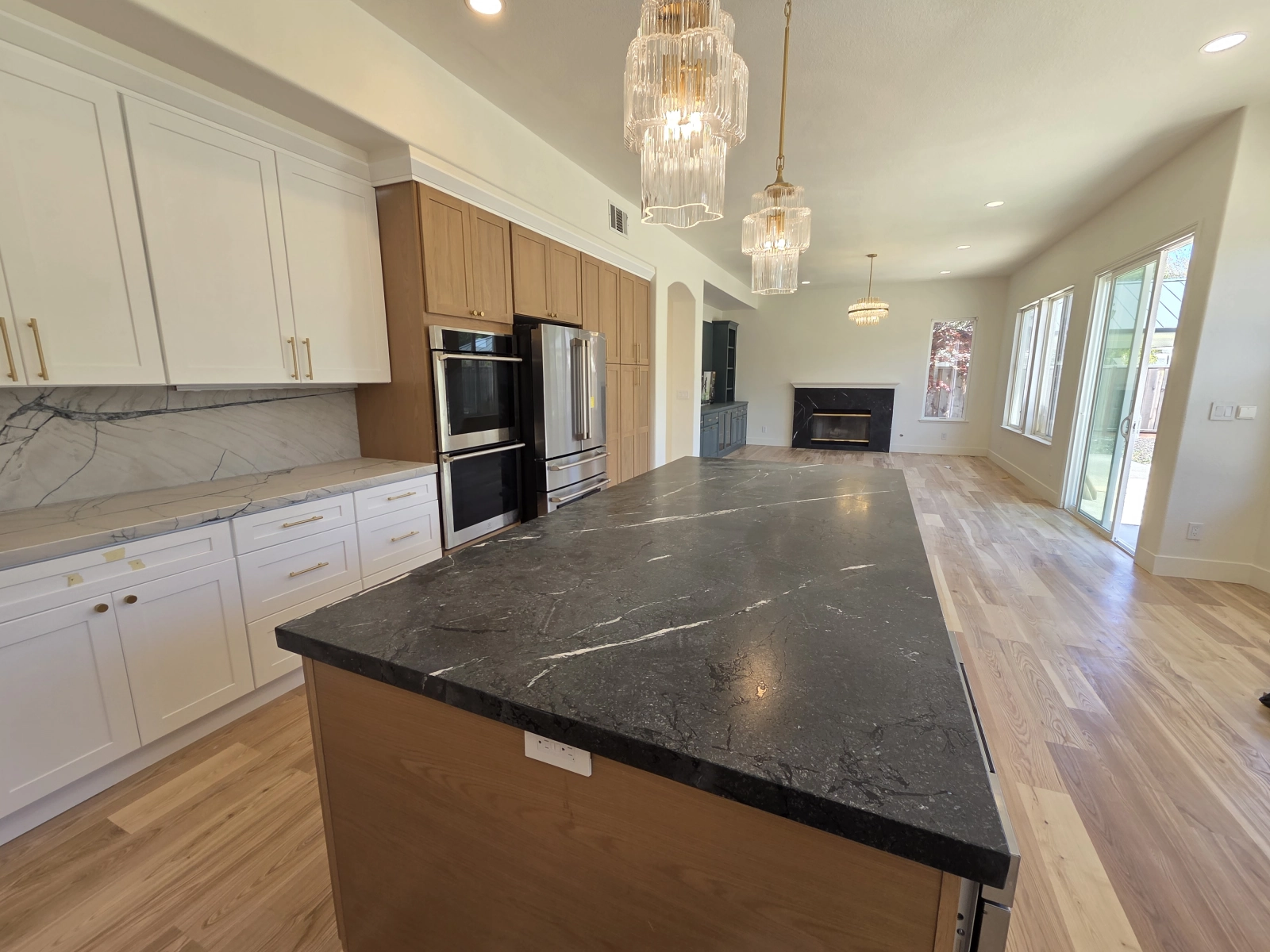 9Builders: Open Concept Kitchen with Stunning Marble and Gold Finishes