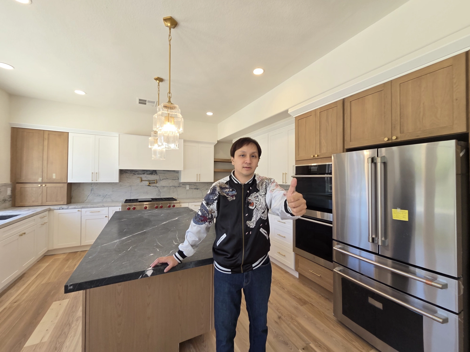 9Builders: Open Concept Kitchen with Gorgeous Marble Backsplash