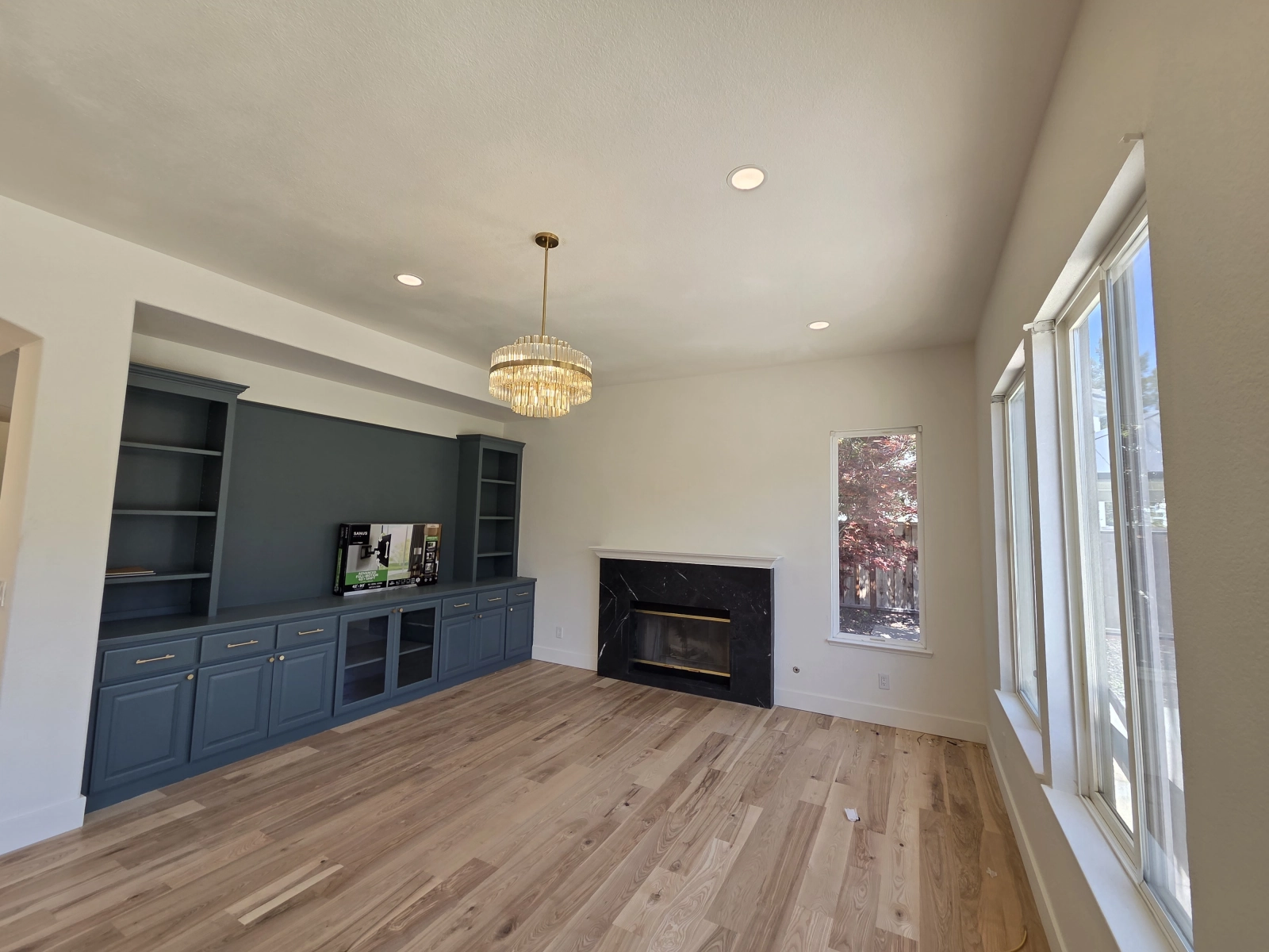 Chic Family Room with Modern Fireplace