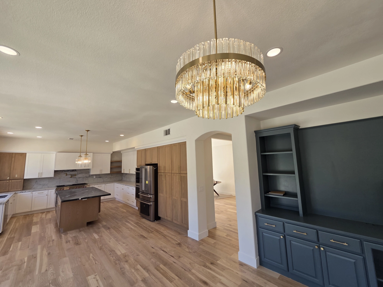 Overlooking Spacious Living Room and Fireplace