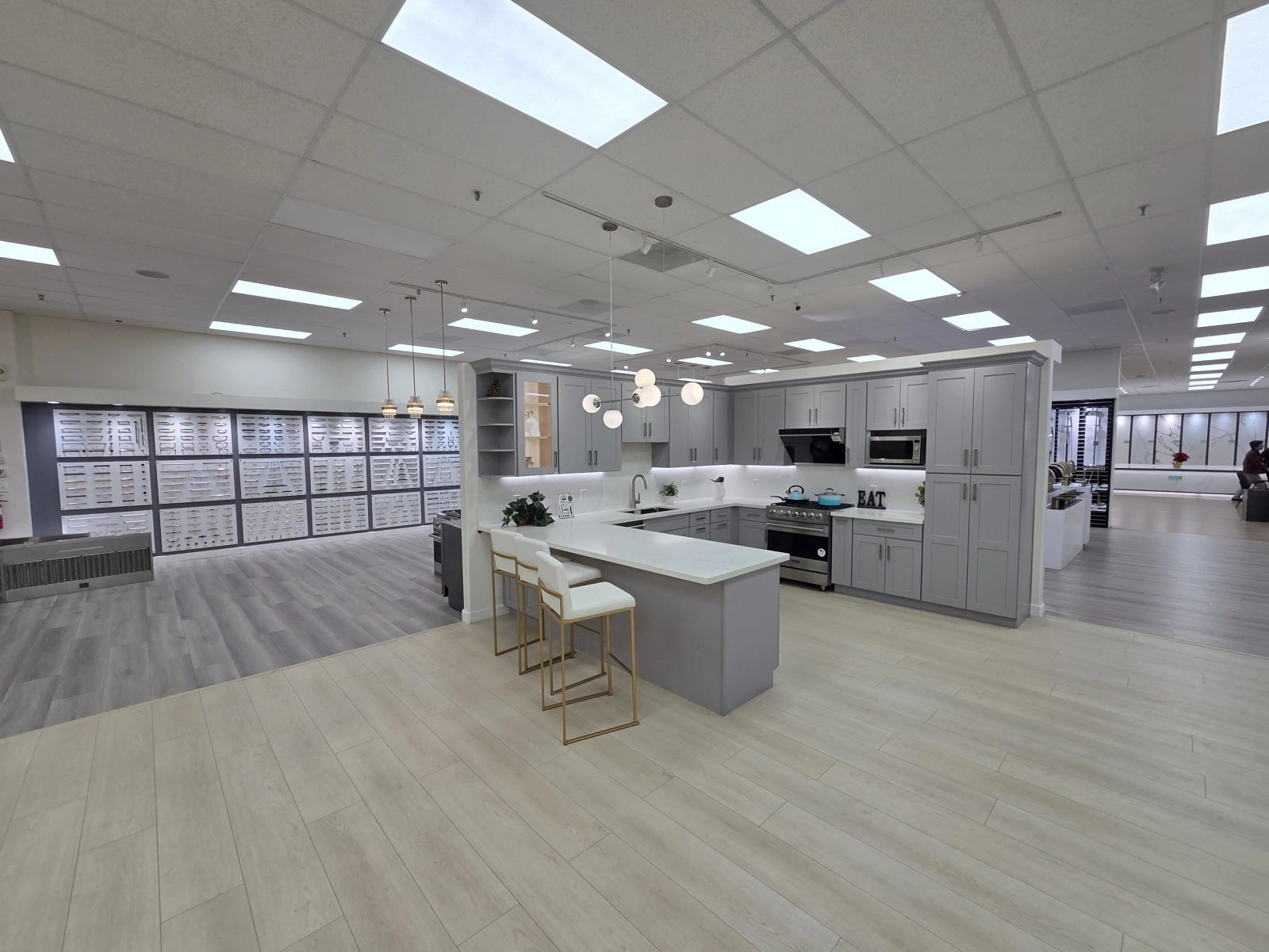 Contemporary Kitchen with Sleek Appliances and Bright Lighting