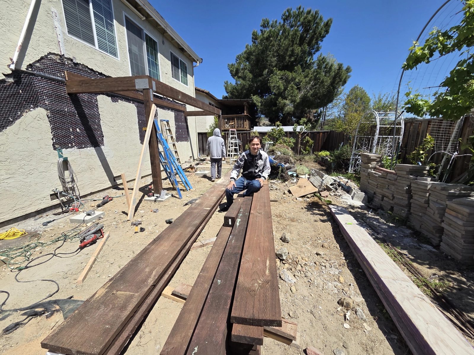 Subfloor view showing moisture barrier installation