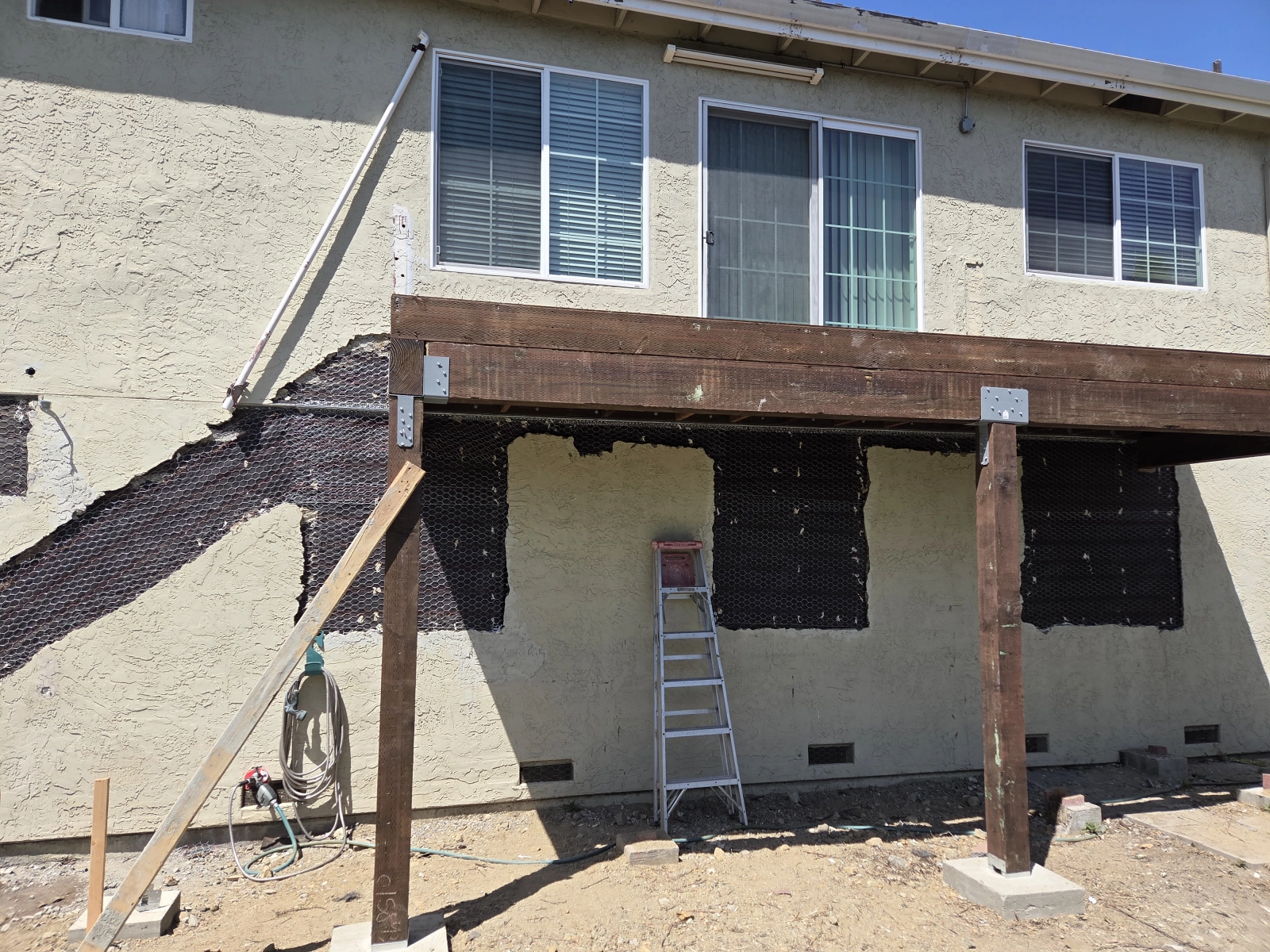Construction materials and site setup for deck build