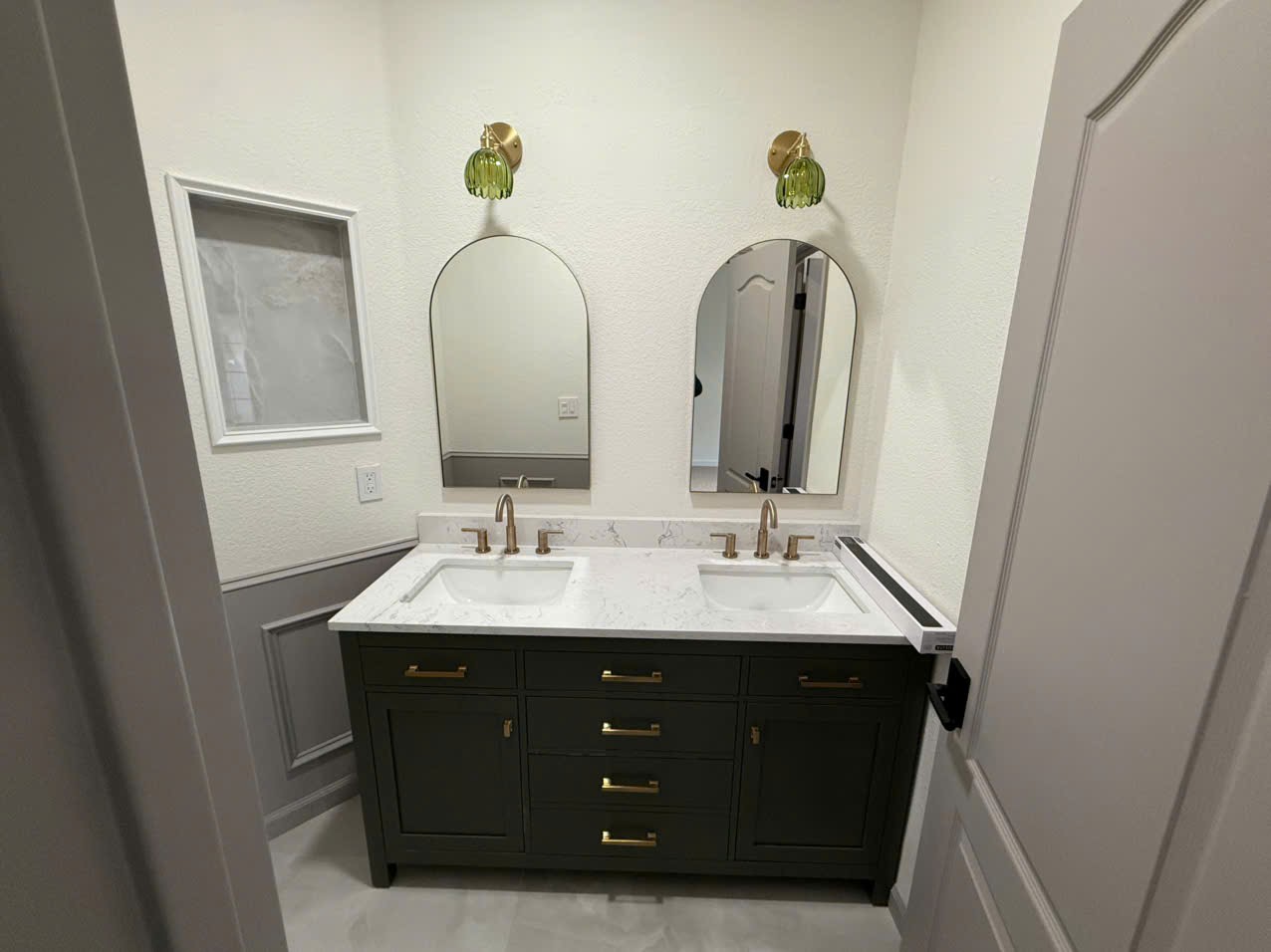 Shower Area with Gold Fixtures